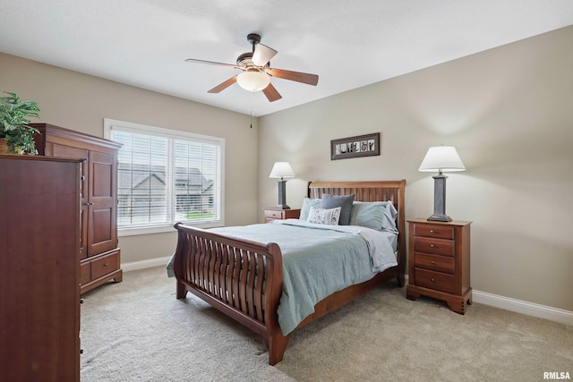 11 Sandstone Ct, Le Claire, IA 52753 - bedroom with light carpet and ceiling fan