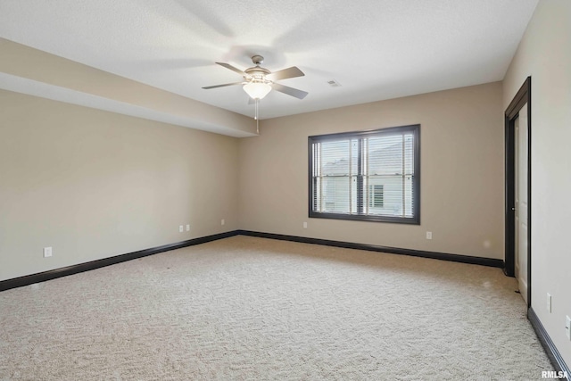 11 Sandstone Ct, Le Claire, IA 52753 - carpeted spare room featuring ceiling fan and baseboards