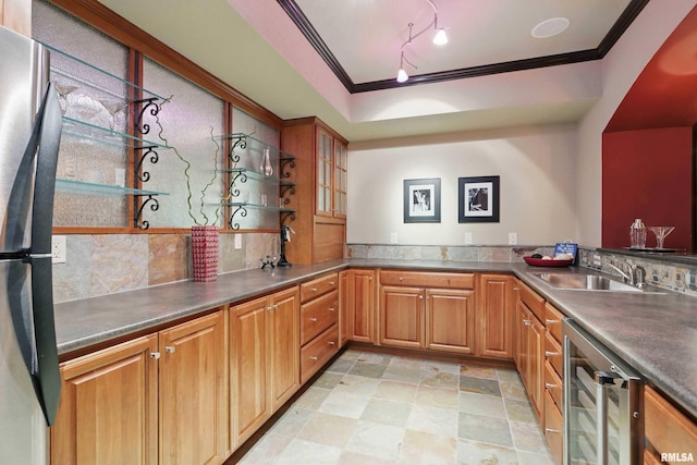 11 Sandstone Ct, Le Claire, IA 52753 - kitchen featuring open shelves, wine cooler, crown molding, freestanding refrigerator, and dark countertops