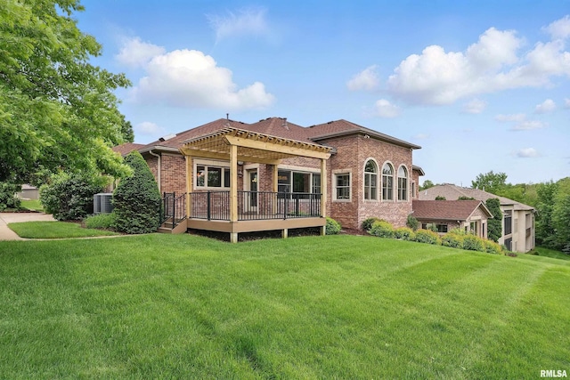 11 Sandstone Ct, Le Claire, IA 52753 - rear view of house featuring a pergola, brick siding, a yard, and a wooden deck
