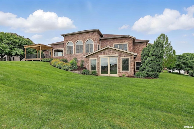 11 Sandstone Ct, Le Claire, IA 52753 - back of property with brick siding, a lawn, and a deck