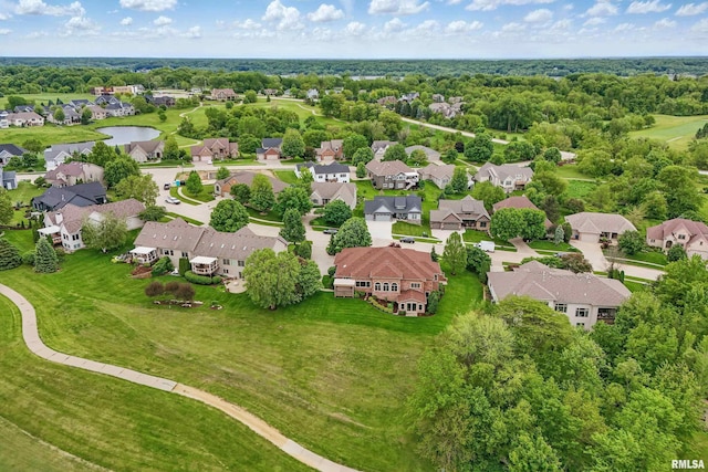 11 Sandstone Ct, Le Claire, IA 52753 - aerial perspective of suburban area with a tree filled landscape and a large body of water