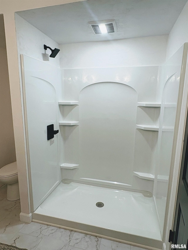 323 N Vail St, Geneseo, IL 61254 - full bathroom with marble look tile flooring and a shower stall
