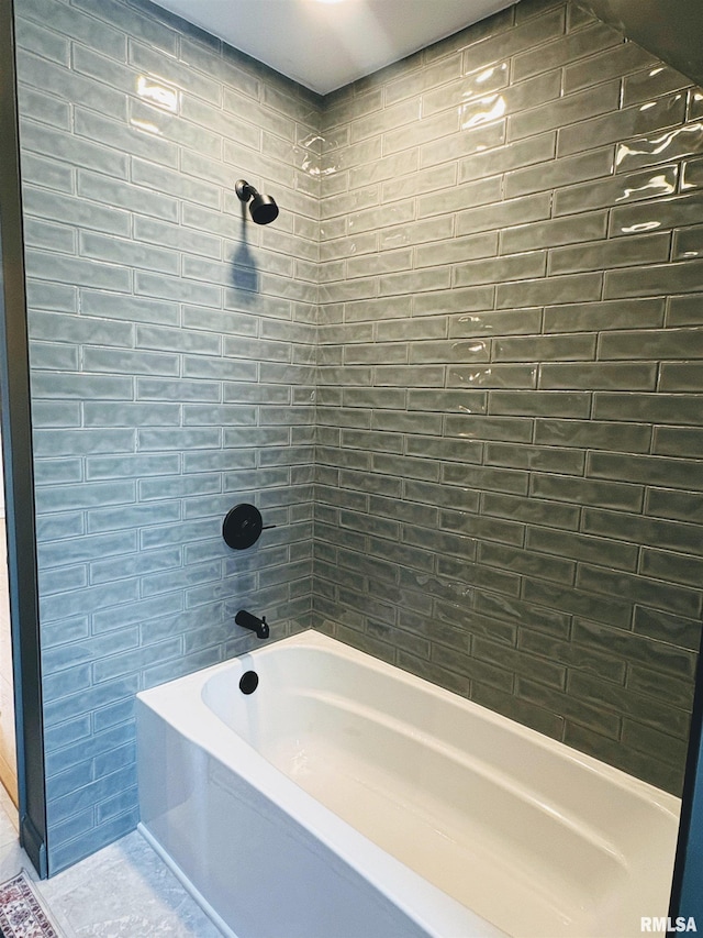 323 N Vail St, Geneseo, IL 61254 - bathroom featuring tile walls and bathing tub / shower combination