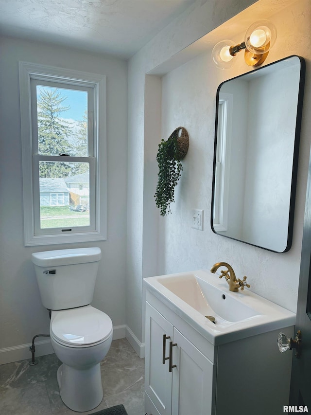 323 N Vail St, Geneseo, IL 61254 - half bath with vanity and baseboards