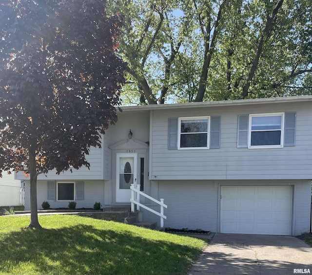 1951 Bristol Dr, Bettendorf, IA 52722 - split foyer home featuring a garage, brick siding, a front lawn, concrete driveway, and entry steps