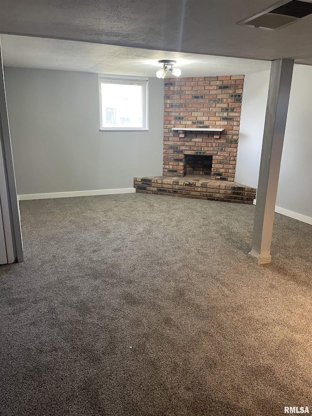 1951 Bristol Dr, Bettendorf, IA 52722 - basement with carpet flooring and a brick fireplace