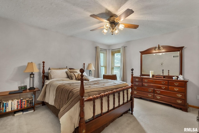 1010 Meadows Cir, Bettendorf, IA 52722 - bedroom featuring carpet floors and ceiling fan