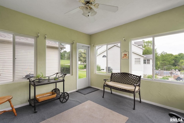 1010 Meadows Cir, Bettendorf, IA 52722 - sunroom featuring plenty of natural light and carpet
