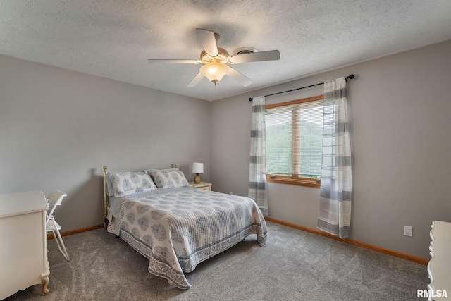 1010 Meadows Cir, Bettendorf, IA 52722 - carpeted bedroom with ceiling fan and a textured ceiling