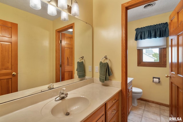 1010 Meadows Cir, Bettendorf, IA 52722 - bathroom with vanity and tile patterned flooring