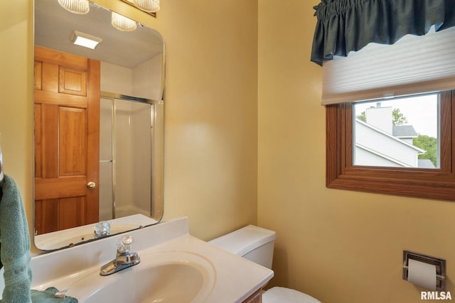 1010 Meadows Cir, Bettendorf, IA 52722 - bathroom featuring a shower stall and vanity