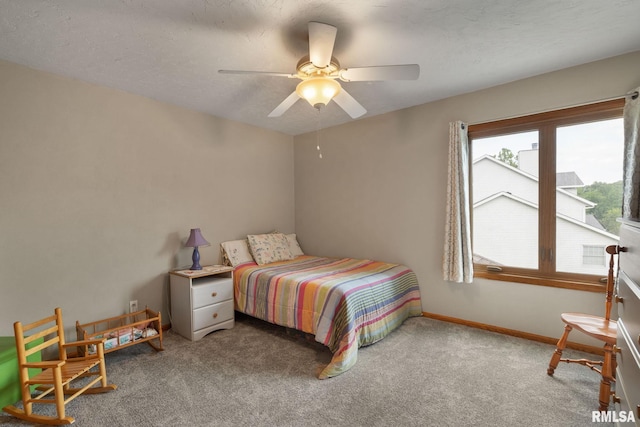 1010 Meadows Cir, Bettendorf, IA 52722 - carpeted bedroom with ceiling fan and baseboards
