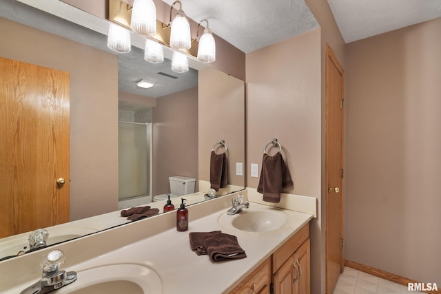 1010 Meadows Cir, Bettendorf, IA 52722 - bathroom featuring a shower with door and double vanity