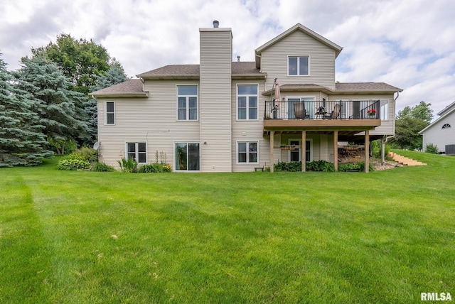 1010 Meadows Cir, Bettendorf, IA 52722 - rear view of property featuring a deck, a yard, and a chimney