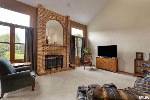1010 Meadows Cir, Bettendorf, IA 52722 - living area with carpet, a fireplace, and high vaulted ceiling