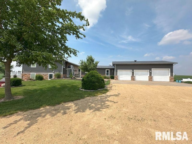2347 230th Ave, Grand Mound, IA 52751 - view of front facade with a front yard and driveway