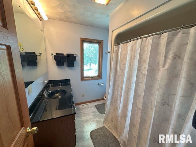 2347 230th Ave, Grand Mound, IA 52751 - full bathroom with vanity and toilet