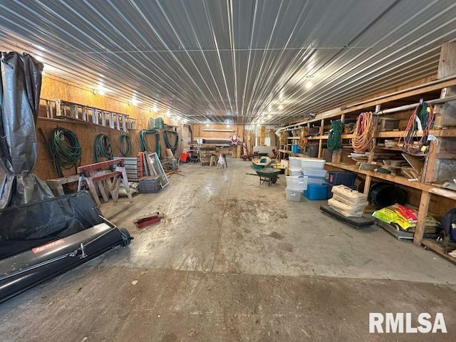2347 230th Ave, Grand Mound, IA 52751 - miscellaneous room featuring concrete floors and a workshop area
