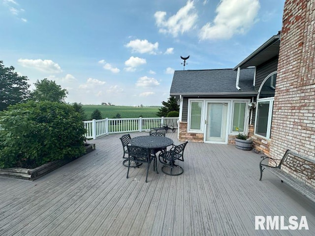 2347 230th Ave, Grand Mound, IA 52751 - wooden terrace with outdoor dining area