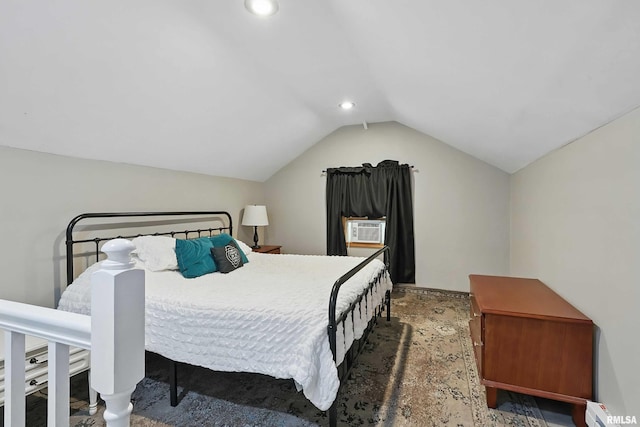 850 27th St, Rock Island, IL 61201 - bedroom with vaulted ceiling, cooling unit, recessed lighting, and a baseboard heating unit