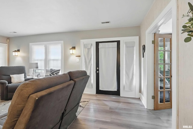 850 27th St, Rock Island, IL 61201 - living area featuring light wood-style floors and healthy amount of natural light