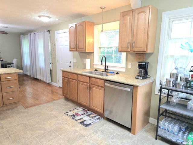 1401 Glopen Rd, Carbondale, IL 62901 - kitchen featuring stainless steel dishwasher, light countertops, and hanging light fixtures
