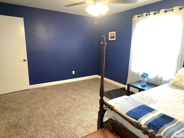 1401 Glopen Rd, Carbondale, IL 62901 - carpeted bedroom featuring multiple windows and ceiling fan