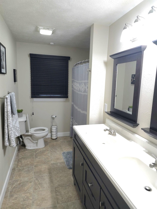 1401 Glopen Rd, Carbondale, IL 62901 - bathroom with double vanity and a textured ceiling