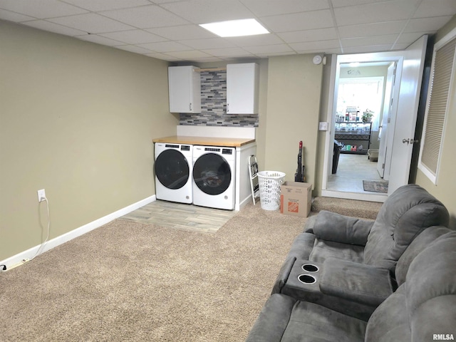1401 Glopen Rd, Carbondale, IL 62901 - laundry room with washing machine and clothes dryer, light colored carpet, and cabinet space