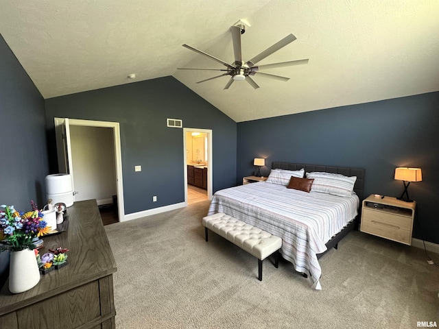 10509 N Butterfly Dr, Dunlap, IL 61525 - carpeted bedroom with vaulted ceiling, ceiling fan, and ensuite bath