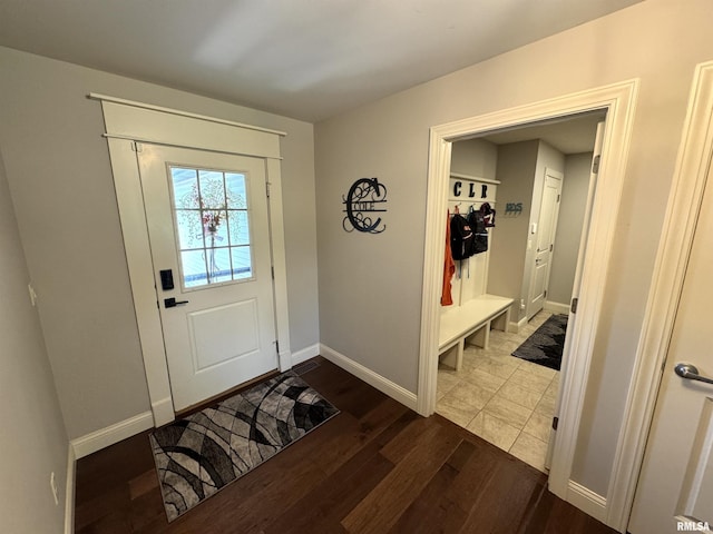 10509 N Butterfly Dr, Dunlap, IL 61525 - mudroom with dark wood-style flooring and baseboards