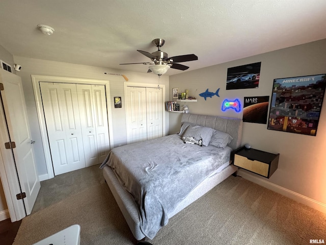 10509 N Butterfly Dr, Dunlap, IL 61525 - carpeted bedroom featuring multiple closets and ceiling fan