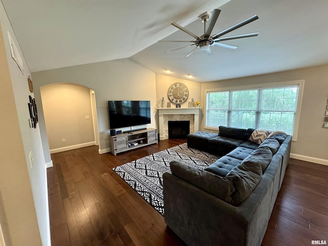 10509 N Butterfly Dr, Dunlap, IL 61525 - living area with a ceiling fan, arched walkways, vaulted ceiling, wood-type flooring, and a fireplace