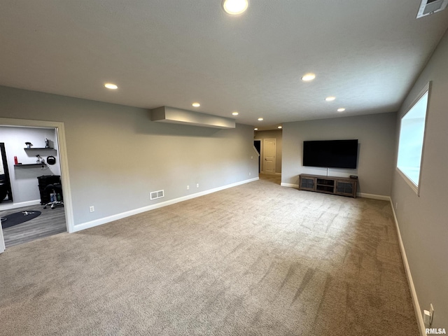 10509 N Butterfly Dr, Dunlap, IL 61525 - unfurnished living room featuring carpet floors and recessed lighting