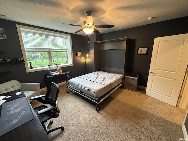 10509 N Butterfly Dr, Dunlap, IL 61525 - bedroom featuring light colored carpet, a textured ceiling, a ceiling fan, and an office area