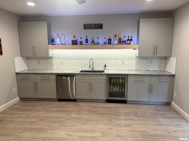 10509 N Butterfly Dr, Dunlap, IL 61525 - kitchen featuring dishwasher, beverage cooler, gray cabinets, tasteful backsplash, and recessed lighting