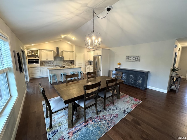 10509 N Butterfly Dr, Dunlap, IL 61525 - dining room featuring lofted ceiling, a chandelier, and dark wood-type flooring