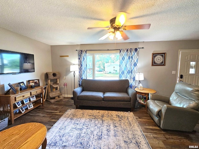 315 Colony Dr, Davenport, IA 52806 - living area featuring dark wood finished floors, ceiling fan, and a textured ceiling