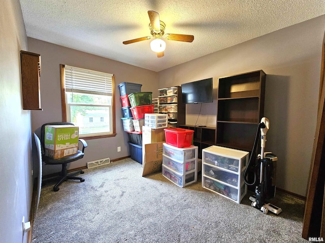 315 Colony Dr, Davenport, IA 52806 - carpeted home office featuring a ceiling fan and a textured ceiling