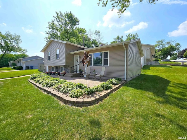 315 Colony Dr, Davenport, IA 52806 - view of front of property featuring a patio and a front lawn