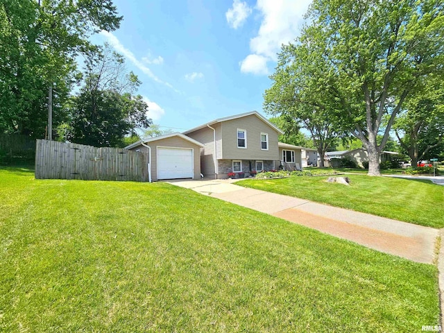 315 Colony Dr, Davenport, IA 52806 - tri-level home featuring driveway and a garage