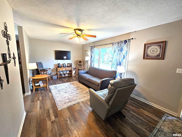 315 Colony Dr, Davenport, IA 52806 - living room with ceiling fan, dark wood finished floors, and a textured ceiling