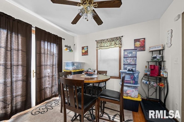 129 S Birchwood Ave, Davenport, IA 52802 - dining space with ceiling fan and wood finished floors