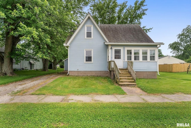 204 E Main St, Joy, IL 61260 - view of front of property featuring a shingled roof