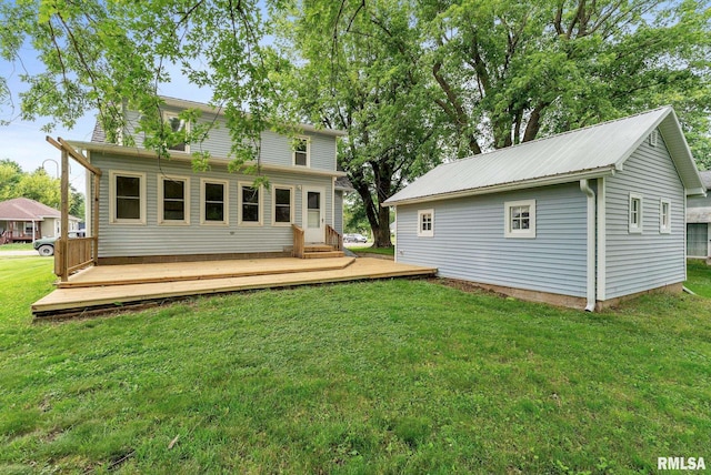204 E Main St, Joy, IL 61260 - back of property with a deck and a lawn