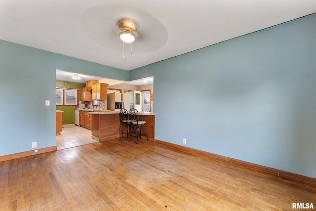 204 E Main St, Joy, IL 61260 - living room featuring light wood finished floors and ceiling fan