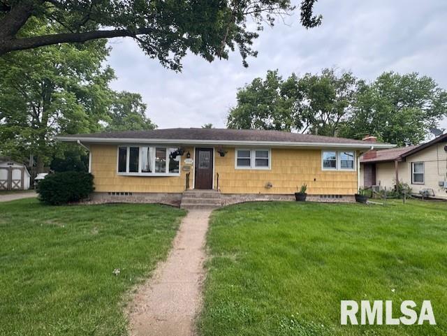 1316 2nd St, Camanche, IA 52730 - view of front of home with a front yard and crawl space