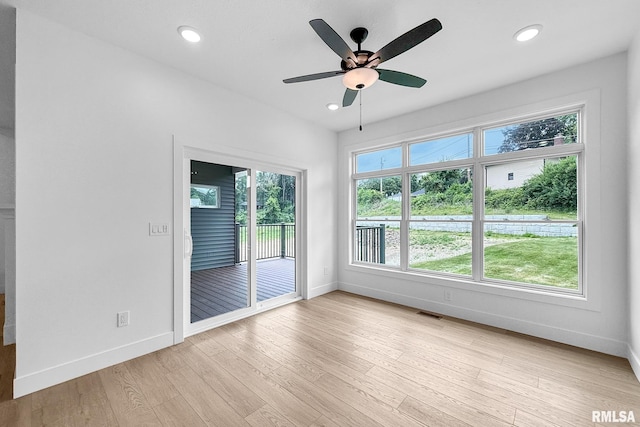 1354 Heights Ct, Bettendorf, IA 52722 - empty room with light wood finished floors, ceiling fan, and recessed lighting