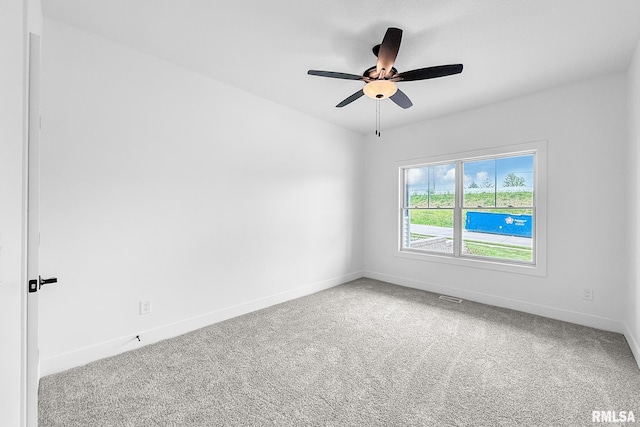 1354 Heights Ct, Bettendorf, IA 52722 - carpeted empty room featuring baseboards and a ceiling fan